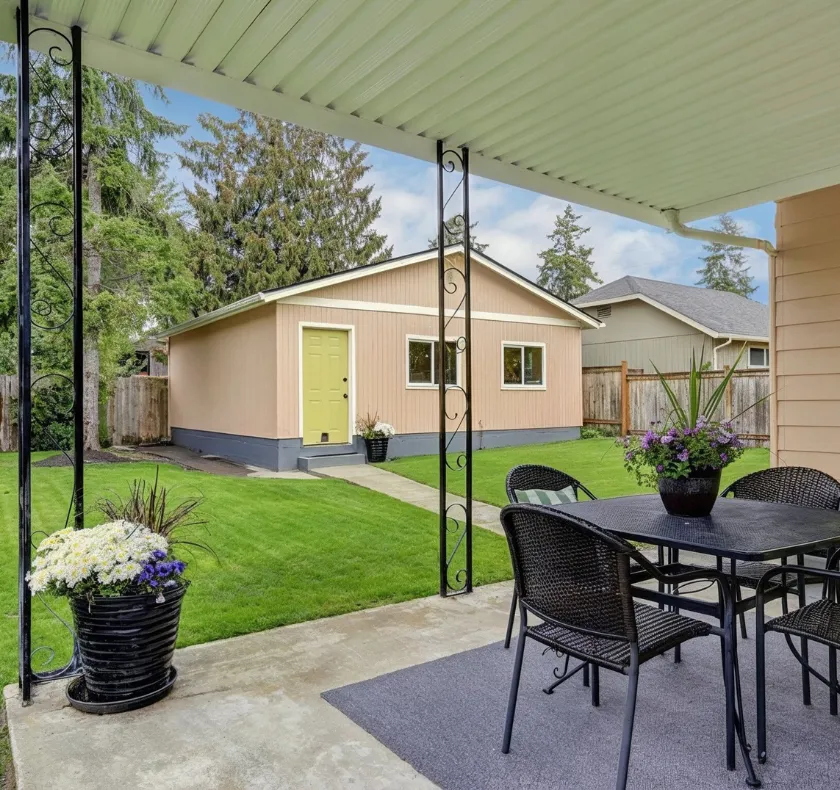 Detached ADU in Los Angeles CA with patio seating and landscaped backyard guest unit